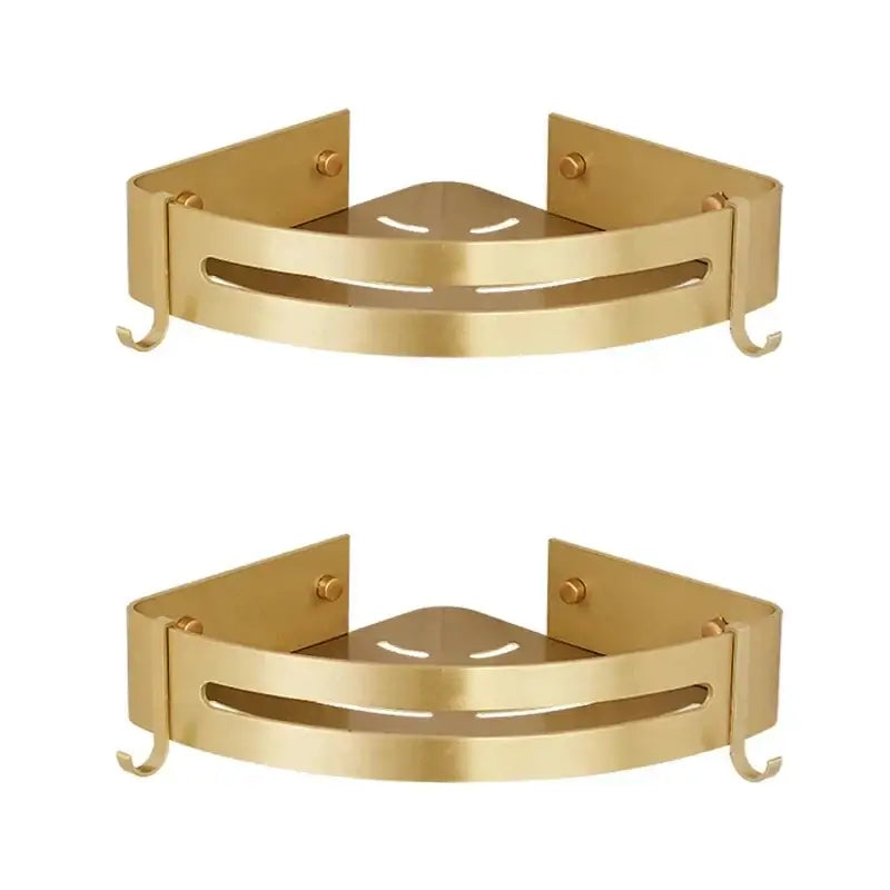 Gold-colored decorbites aluminum shower shelf with two hooks and central cutout for bathroom corner use
