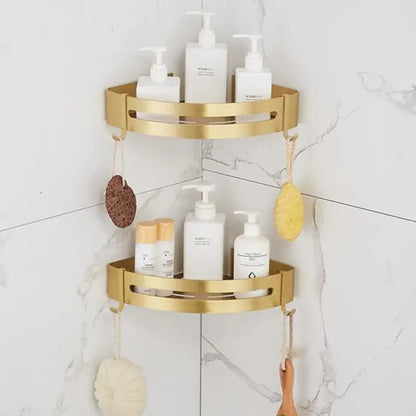 Gold-colored two-tiered decorbites aluminum shower shelf with brushed aluminum finish and open slotted design for bathroom corner