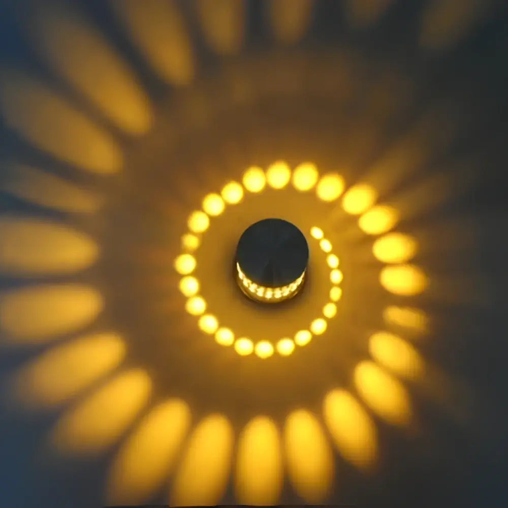Decorbites aluminum spiral led wall lamp with black base and warm yellow concentric rings for bedroom and living room