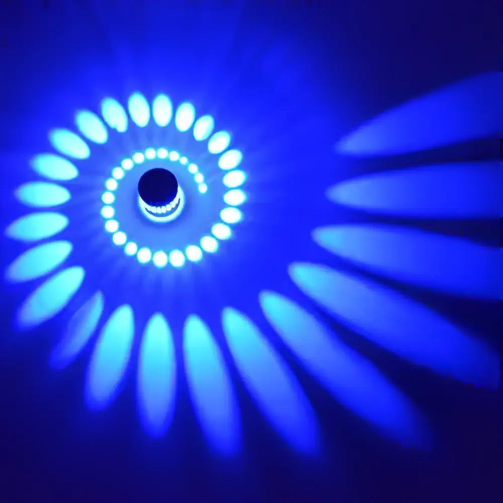 Blue spiral led wall lamp by DecorBites aluminum spiral casting a radiant glow for bedroom and living room decor
