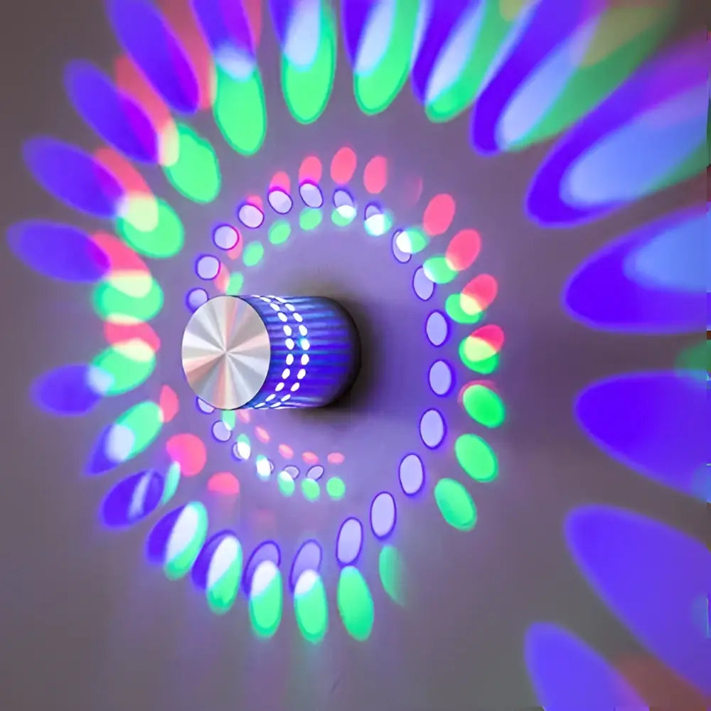 A sleek metallic DecorBites aluminum spiral led wall lamp with colorful spiral lighting for bedroom and living room