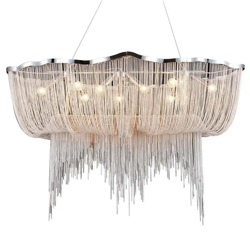 A modern silver-toned decorbites aluminum tassel chandelier with scalloped frame and cascading metallic chains for living room