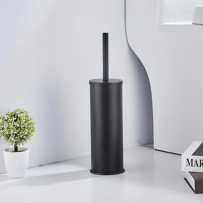 Black matte-finished aluminum toilet brush holder with matching handle from DecorBites™ brush holder set in brushed gold black