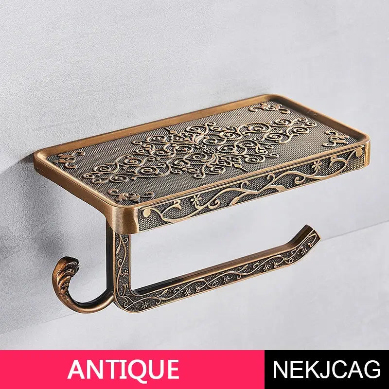 Antique bronze-finished aluminum toilet paper holder with floral embossing shelf and support arm by DecorBites paper holder