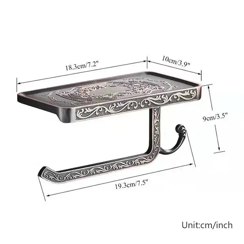 Antique silver-toned aluminum toilet paper holder with phone rack and intricate floral engraving for paper holder use