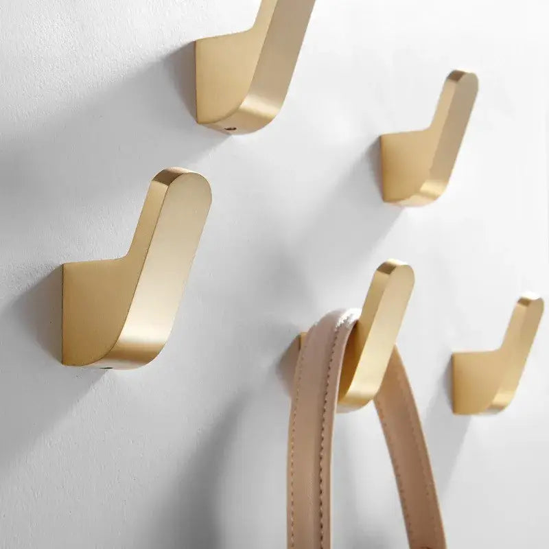 Decorbites aluminum towel hook set in brushed gold with sleek minimalist design for kitchen and bathroom use