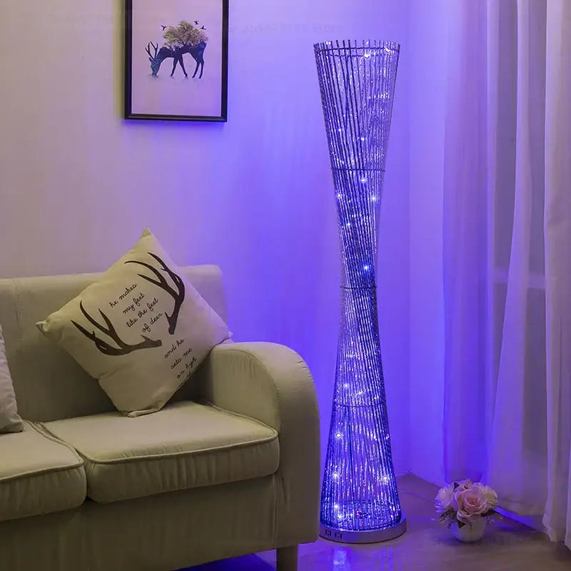 Tall slender decorbites aluminum tower floor lamp with woven wireframe and blue led lights for modern living room decor