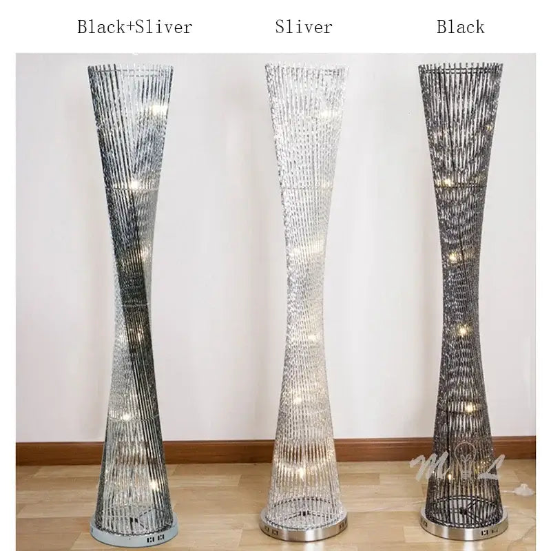 Three decorbites aluminum tower floor lamps in black silver and black finishes with twisted wireframe LED design for living room