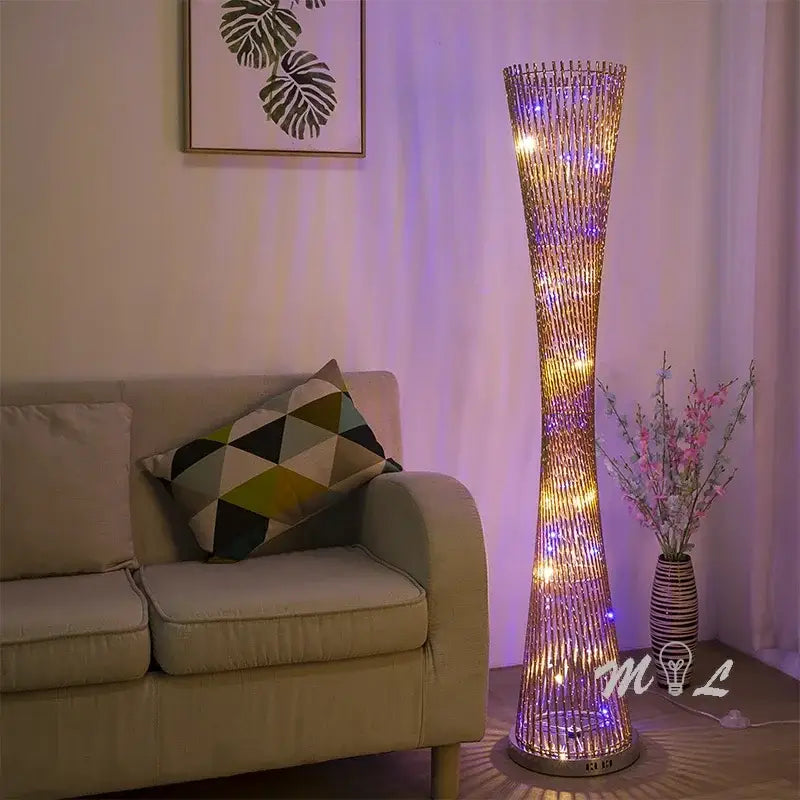 Tall slender decorbites aluminum tower floor lamp with golden metallic frame and warm yellow and cool purple led lights