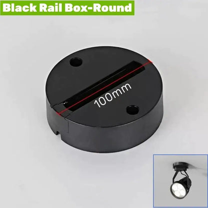 Black round aluminum track rail with 100mm diameter two mounting holes and central slot for track lighting fixtures