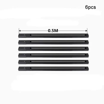 Six black plastic track pieces 0.5 meters each with central slot for mounting hardware in decorbites aluminum track rails