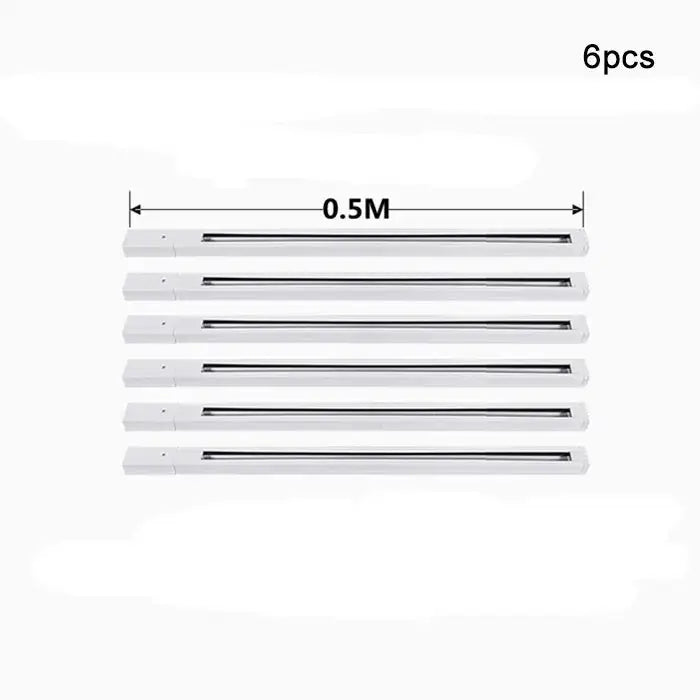 Six white led strip lights with a slim profile and black channel on decorbites aluminum track rails for spotlights