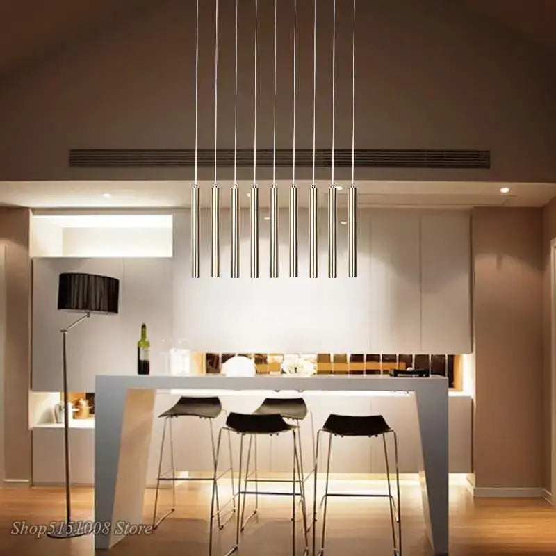 Modern minimalist decorbites pendant light with seven chrome aluminum rods for dining room and kitchen decor