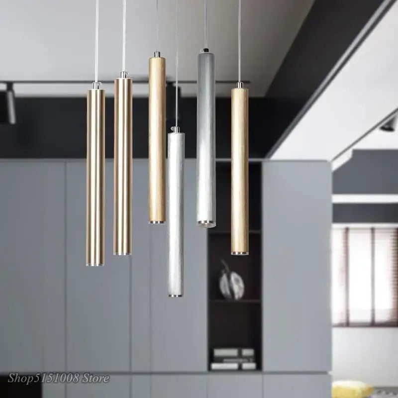 Modern cylindrical decorbites pendant light in brushed gold and silver aluminum for dining room and kitchen decor