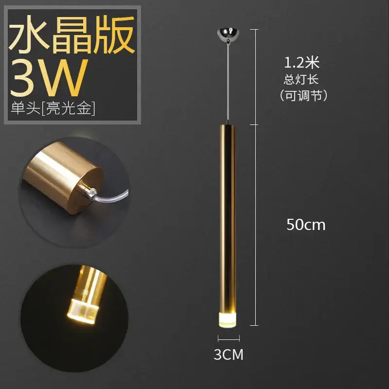 A sleek decorbites pendant light with 3w crystal pendant, polished gold aluminum tube for dining room and kitchen decor