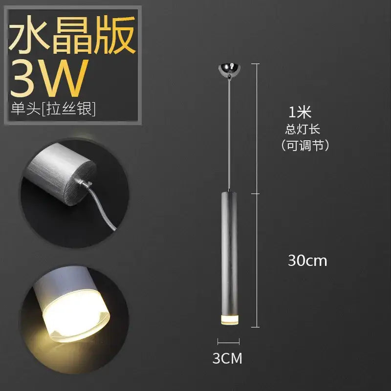 A sleek cylindrical 3w decorbites pendant light with brushed silver aluminum and frosted glass for kitchen decor