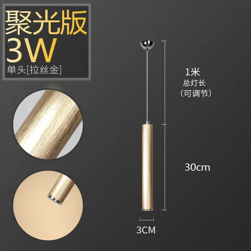 A sleek brushed gold aluminum tube pendant light with 3w led bulb for dining room by DecorBites pendant light