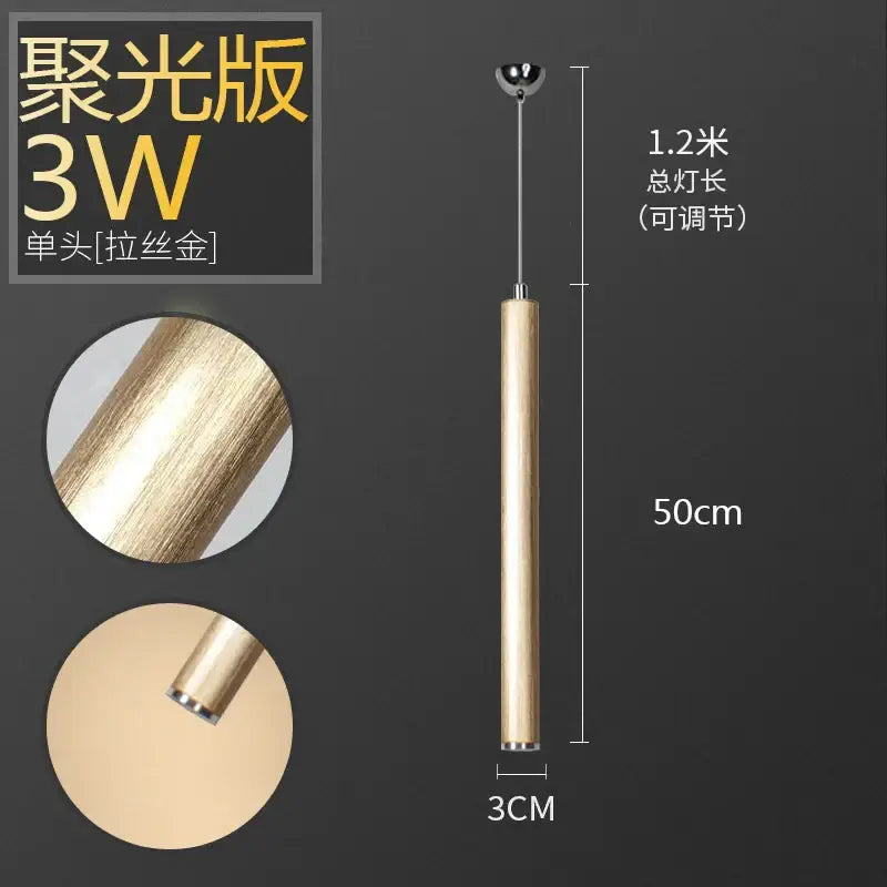 A sleek cylindrical decorbites pendant light with brushed gold aluminum tube and polished chrome top for dining room