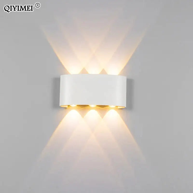 White rectangular decorbites aluminum wall lamps with three warm lights emitting soft angled glow for living room lighting