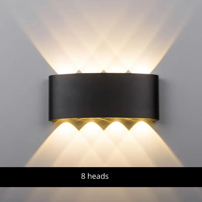 Black cylindrical decorbites aluminum wall lamp with eight warm white led light heads for bedside lighting