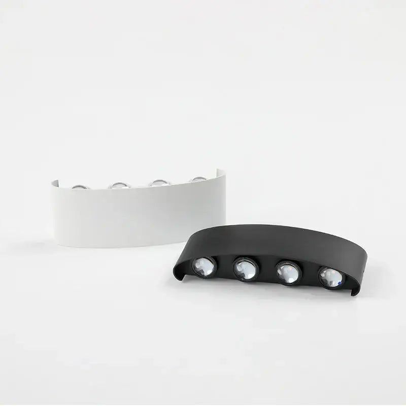 Modern curved decorbites aluminum wall lamp with four circular led lights in white and matte black finishes