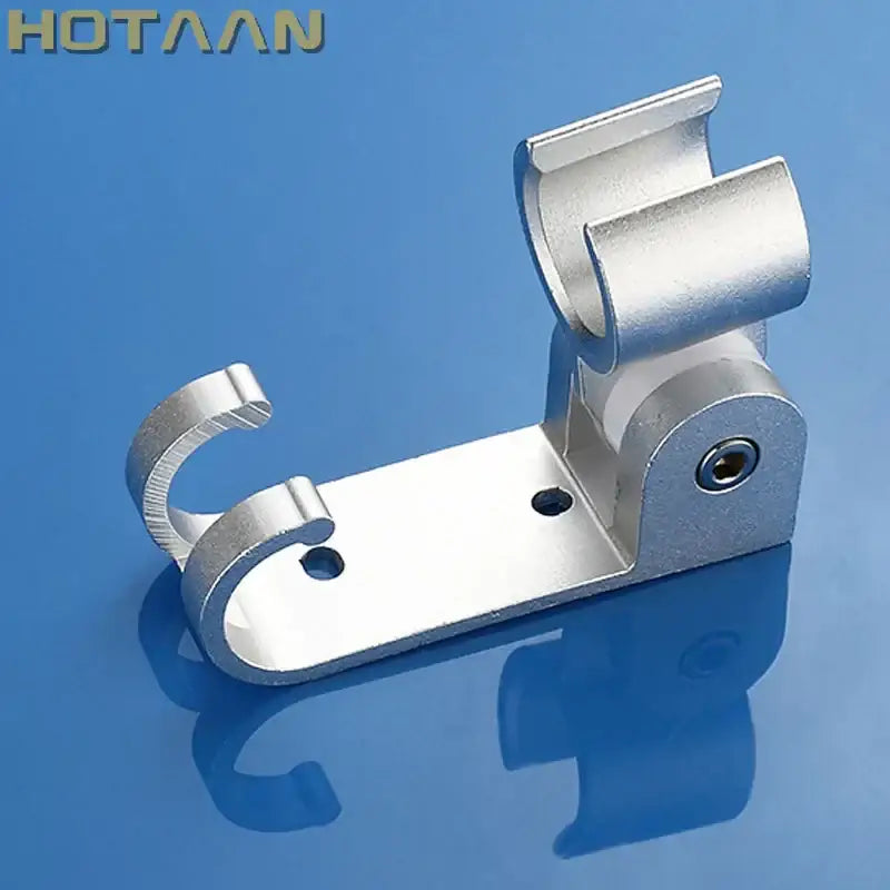 Silver-colored aluminum wall mounted hand shower holder hook bracket with sleek industrial design and two curved hooks by DecorBites