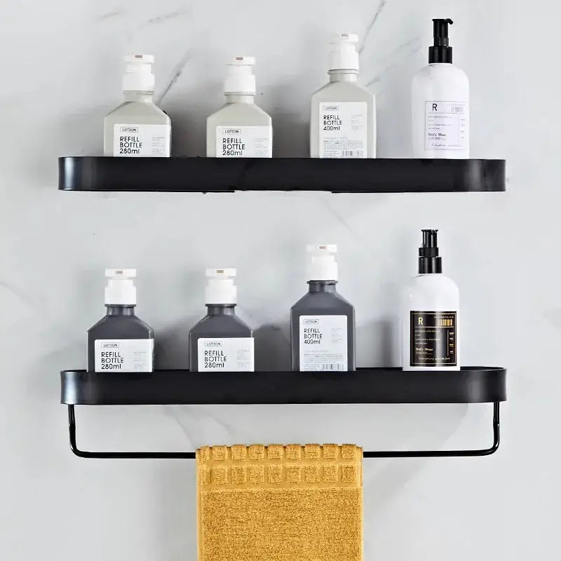 Decorbites aluminum black metal bathroom shelf with towel bar and corner storage shelf holding lotion bottles
