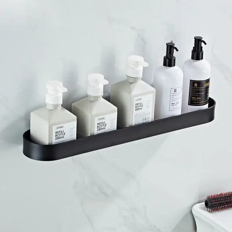 Black metal DecorBites bathroom shelf with towel bar and corner storage shelf holding five white pump bottles