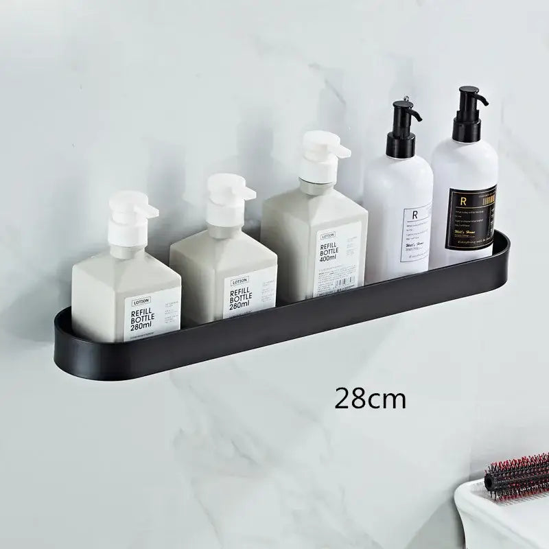 DecorBites™ aluminum bathroom shelf with matte black finish corner storage shelf and towel bar holding lotion bottles