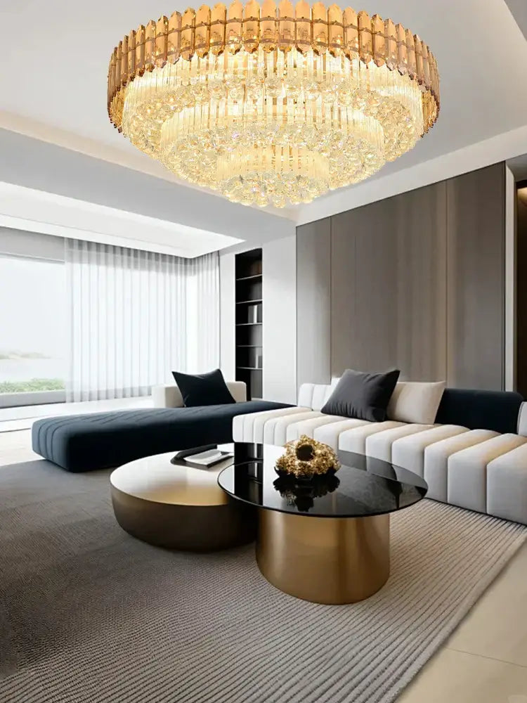 A luxurious gold-toned decorbites amber crystal ceiling light with cascading faceted crystals reflecting light