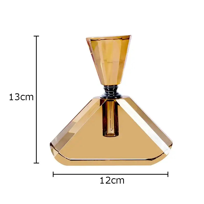 DecorBites amber crystal perfume bottle with faceted amber glass and geometric pyramid base for essential oils