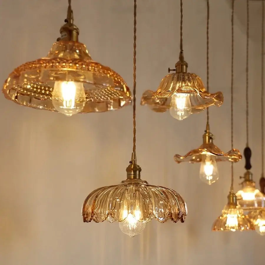 Decorbites amber flower glass led pendant light features golden hand-blown flower glass and brass fixtures