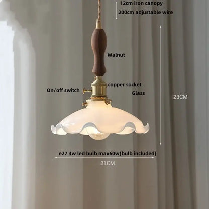 Decorbites amber flower glass pendant light with warm walnut handle brass accents and frosted scalloped shade