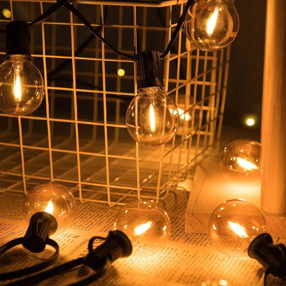 Decorbites amber glass bulb dimmable led string lights with warm-toned clear glass and black plastic sockets for party decor