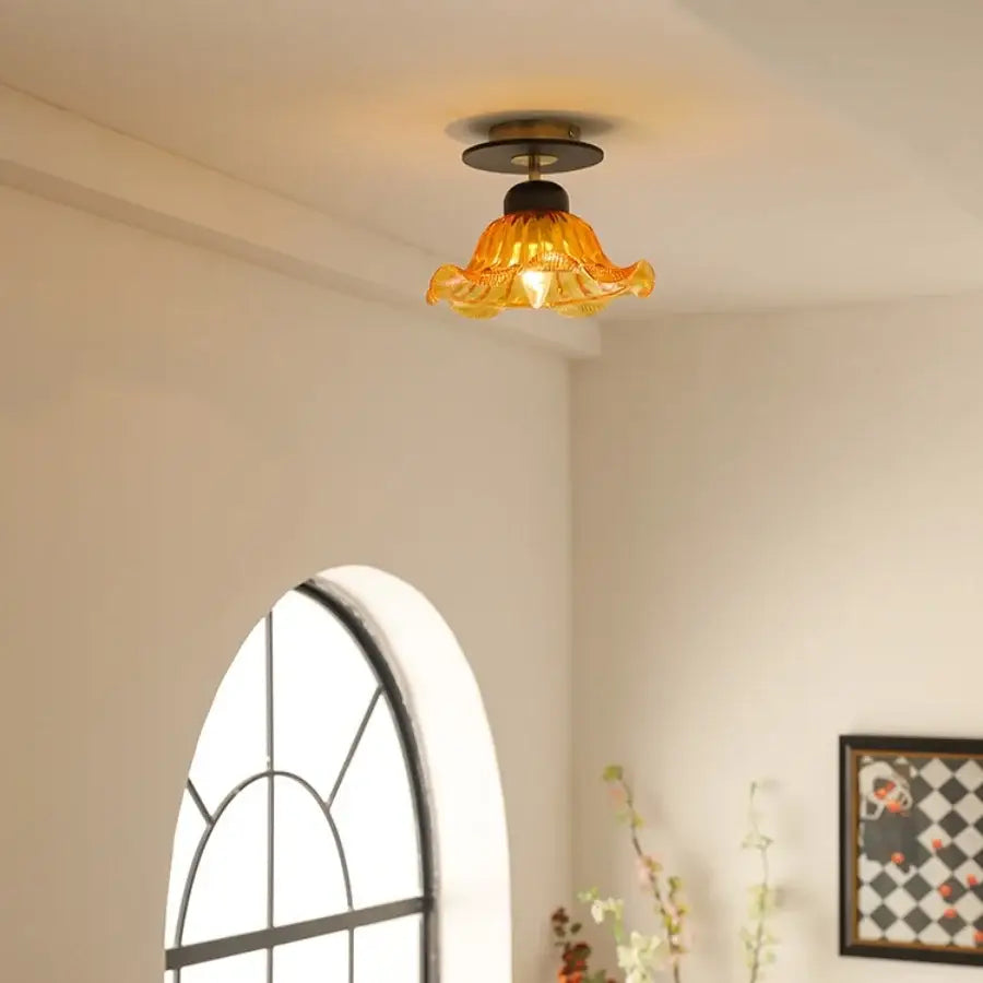 Decorbites amber glass ceiling lamp with warm amber glass and dark metal base for bedroom or bathroom lighting