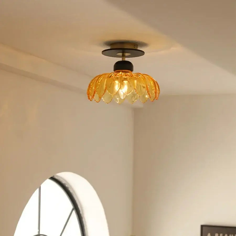 Decorbites amber glass ceiling lamp with warm amber glass petals and brass metal base for modern bedroom lighting