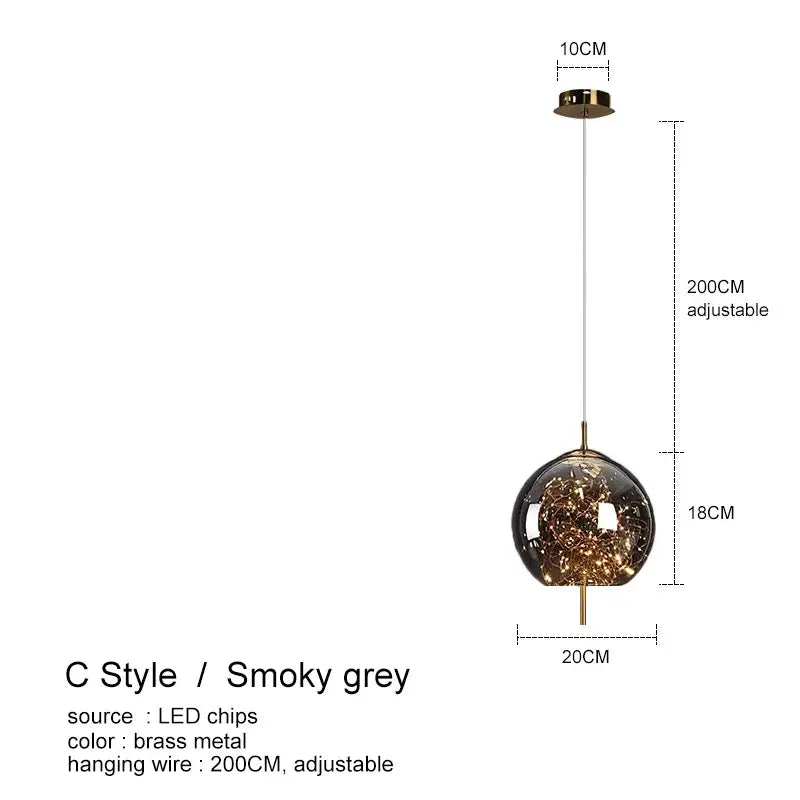 Smoky grey spherical pendant light with brass accents and led chips in decorbites amber glass chandelier design