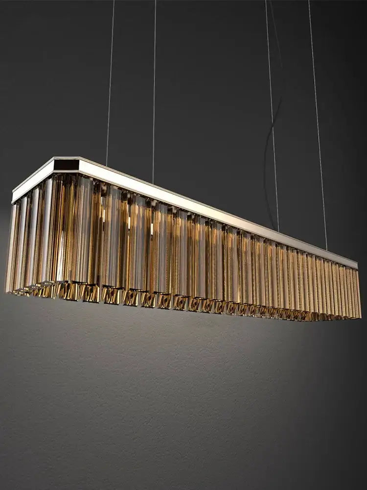 DecorBites amber glass chandelier with sleek metallic frame and vertical amber glass tubes for Nordic dining room lighting