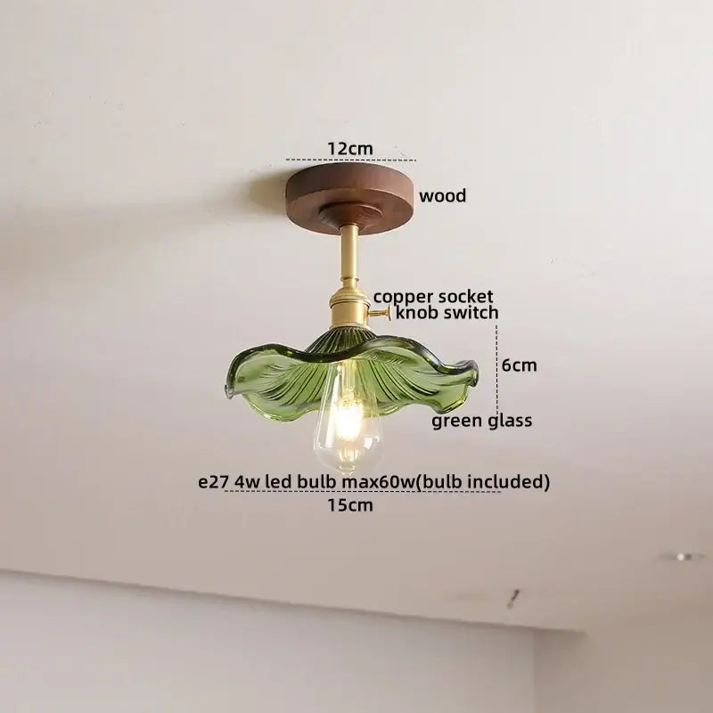 DecorBites™ amber glass copper ceiling light fixture with a green leaf-shaped pendant, wooden base, and LED bulb