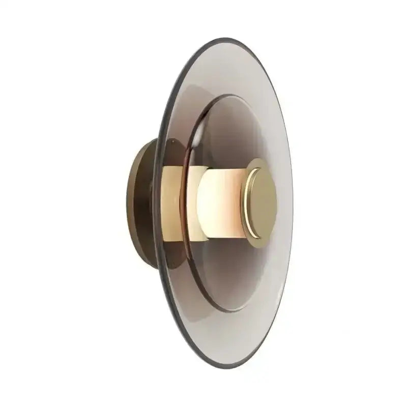 Modern minimalist led wall lamp with layered smoked glass shades and brass finished central accent by DecorBites