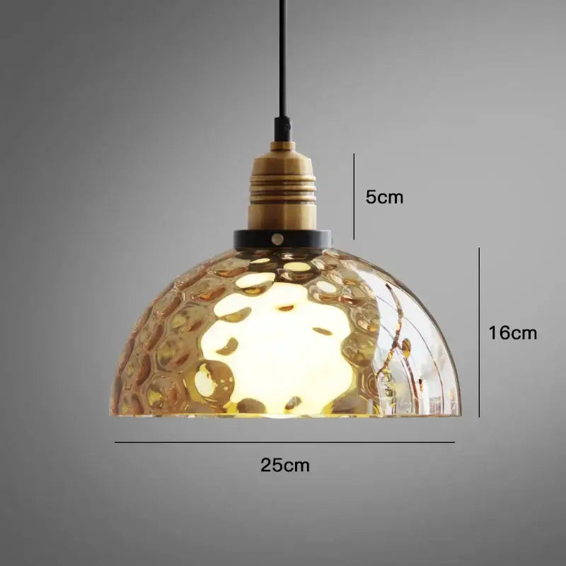 Decorbites amber glass industrial pendant lights with textured bubble surface and brass hardware for dining bedroom use