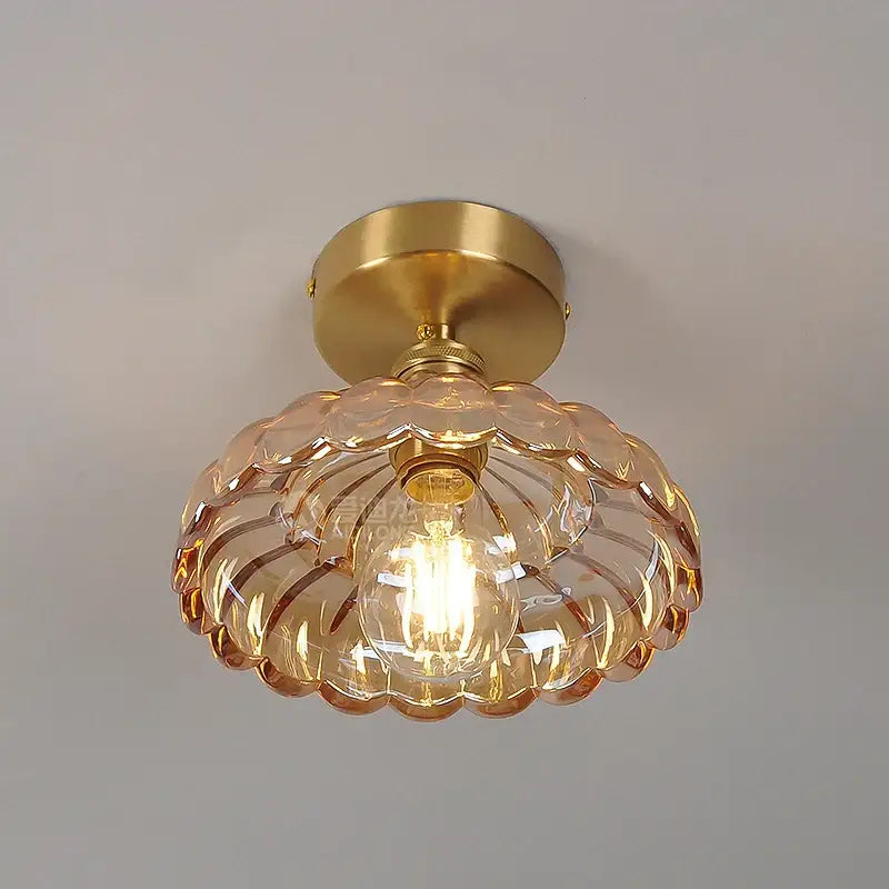 DecorBites™ amber glass led ceiling lamp with warm amber scalloped glass and brass-finished mounting base for indoor use