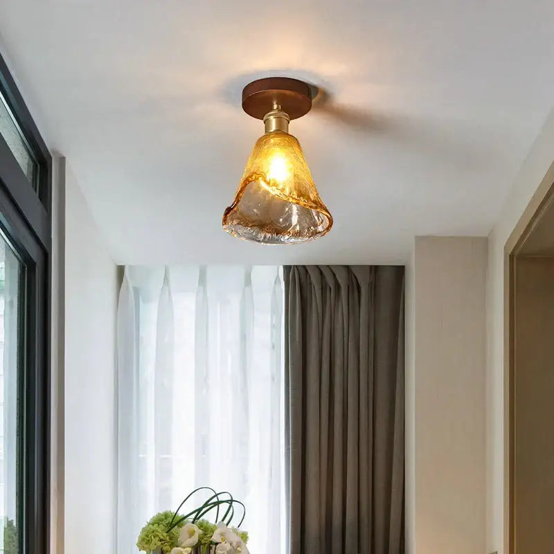 Decorbites amber glass led ceiling light with warm-toned amber glass pendant and brass-finished metal base