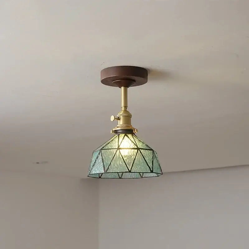 Decorbites™ amber glass led ceiling light with brass-finished metal fixture and green geometrically patterned glass shade