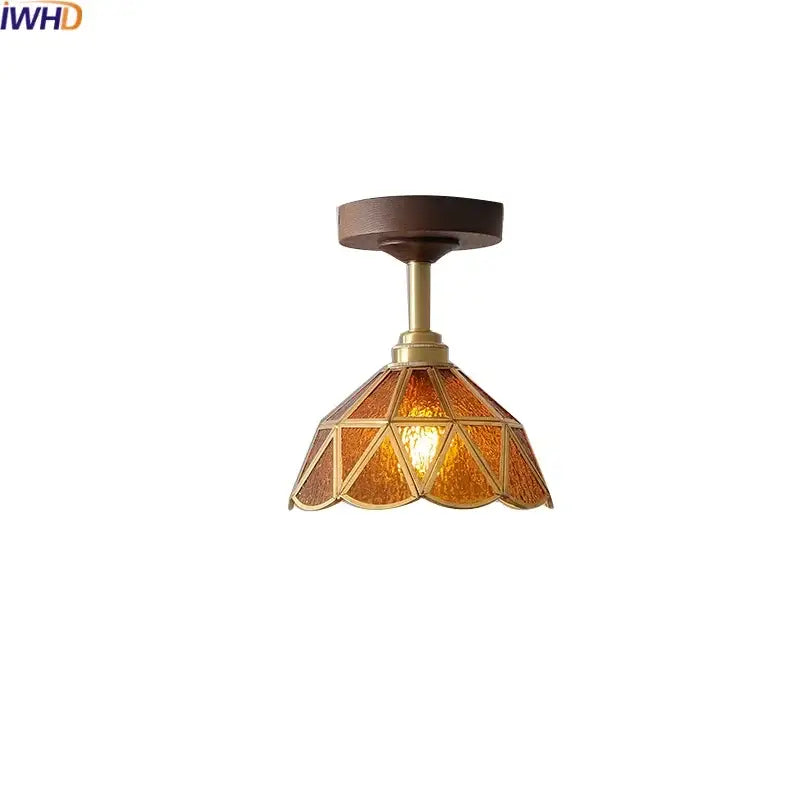 Decorbites amber glass led ceiling light with warm amber glass, brass finish, and wood canopy for kids room