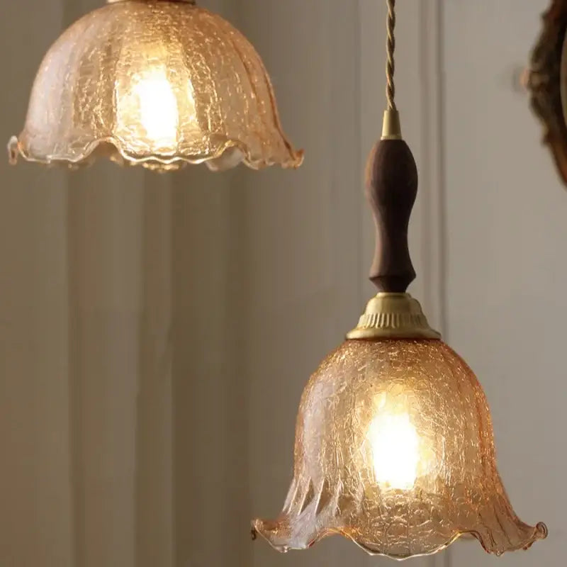 Decorbites amber glass led pendant lamp with warm amber textured glass dark walnut wood handle and brass accents