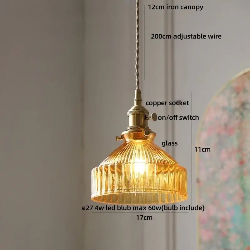 Decorbites amber glass led pendant light with golden ribbed glass and brass metal components with adjustable wire suspension