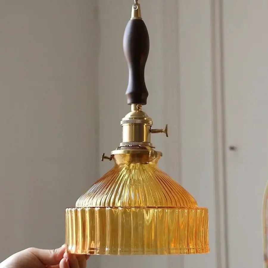 DecorBites™ amber glass led pendant light with golden ribbed glass, dark wood handle, and brass hardware for modern home lighting