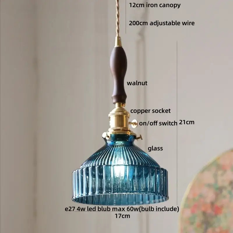 Blue ribbed glass pendant light with walnut finished iron canopy and brass hardware perfect as a glass led pendant