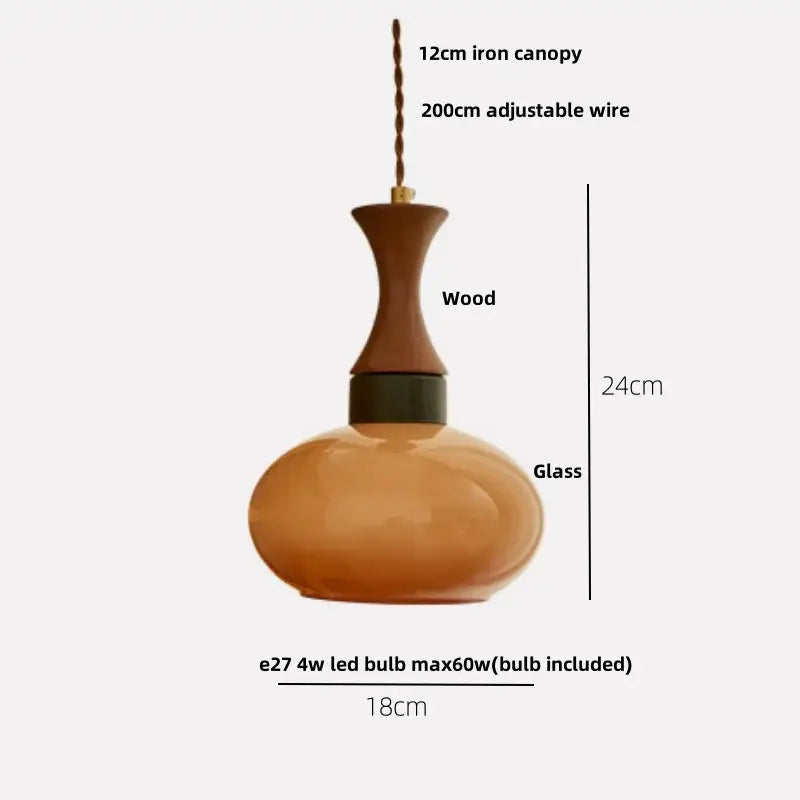 Decorbites amber glass led pendant light with warm amber glass shade wooden neck and black metal band suspended by iron wire